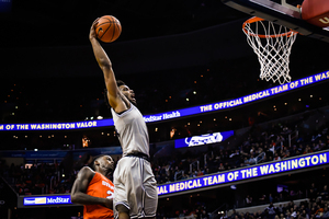 Georgetown goes up for a dunk in Syracuse's close win last year.