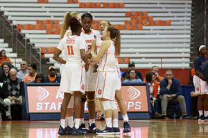 Syracuse players huddle during the team's win over Pittsburgh earlier this month.